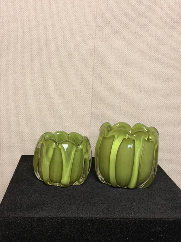 Waxinelichthouder Groen β Glas Groene glazen waxinelichthouders in groot en klein formaat.